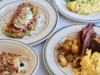 Avocado toast, granola, and omelette, and a country breakfast